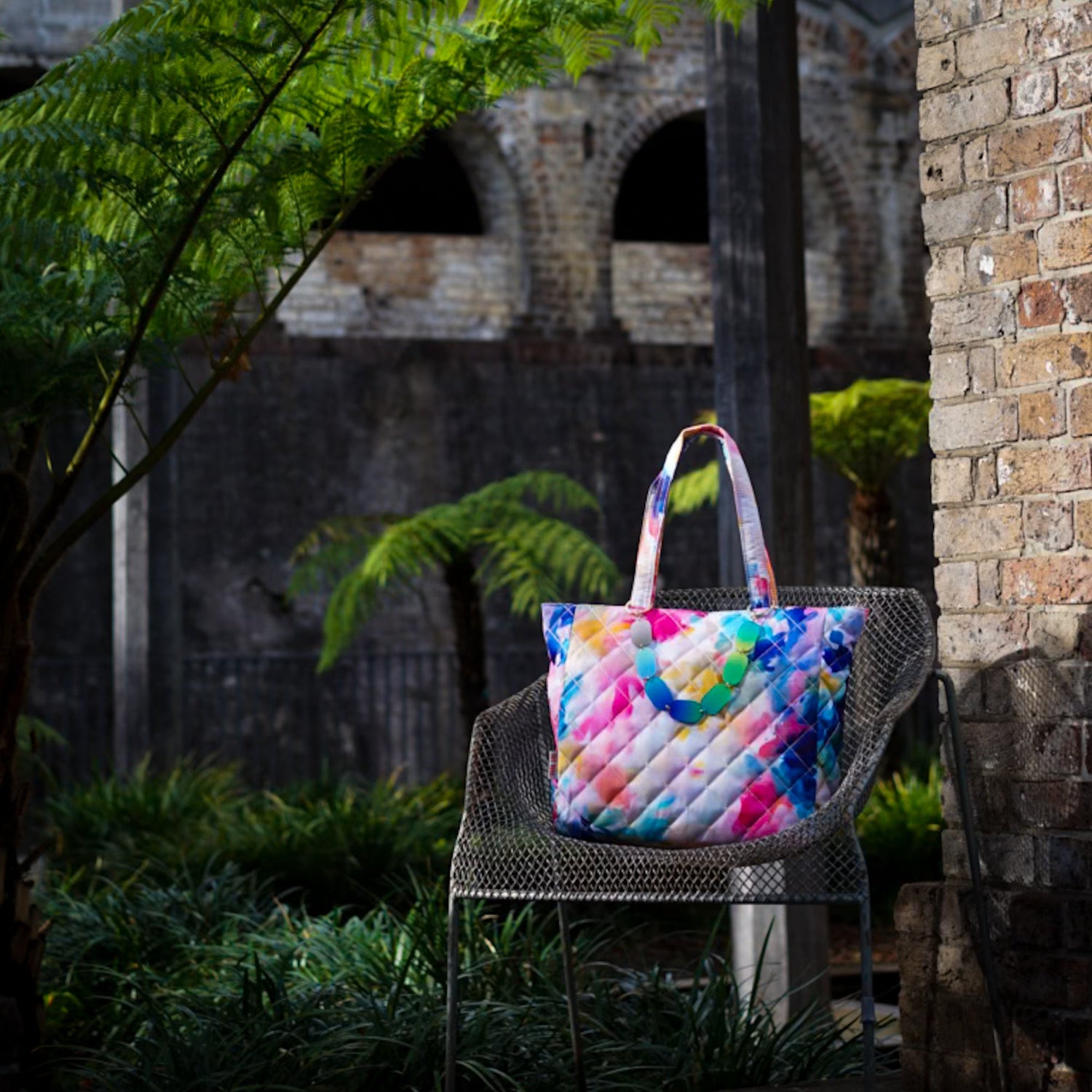 Lilt Tote women's Joy Dress Tote Midi in InkSwoop monochrome abstract art print in front of colourful modern art